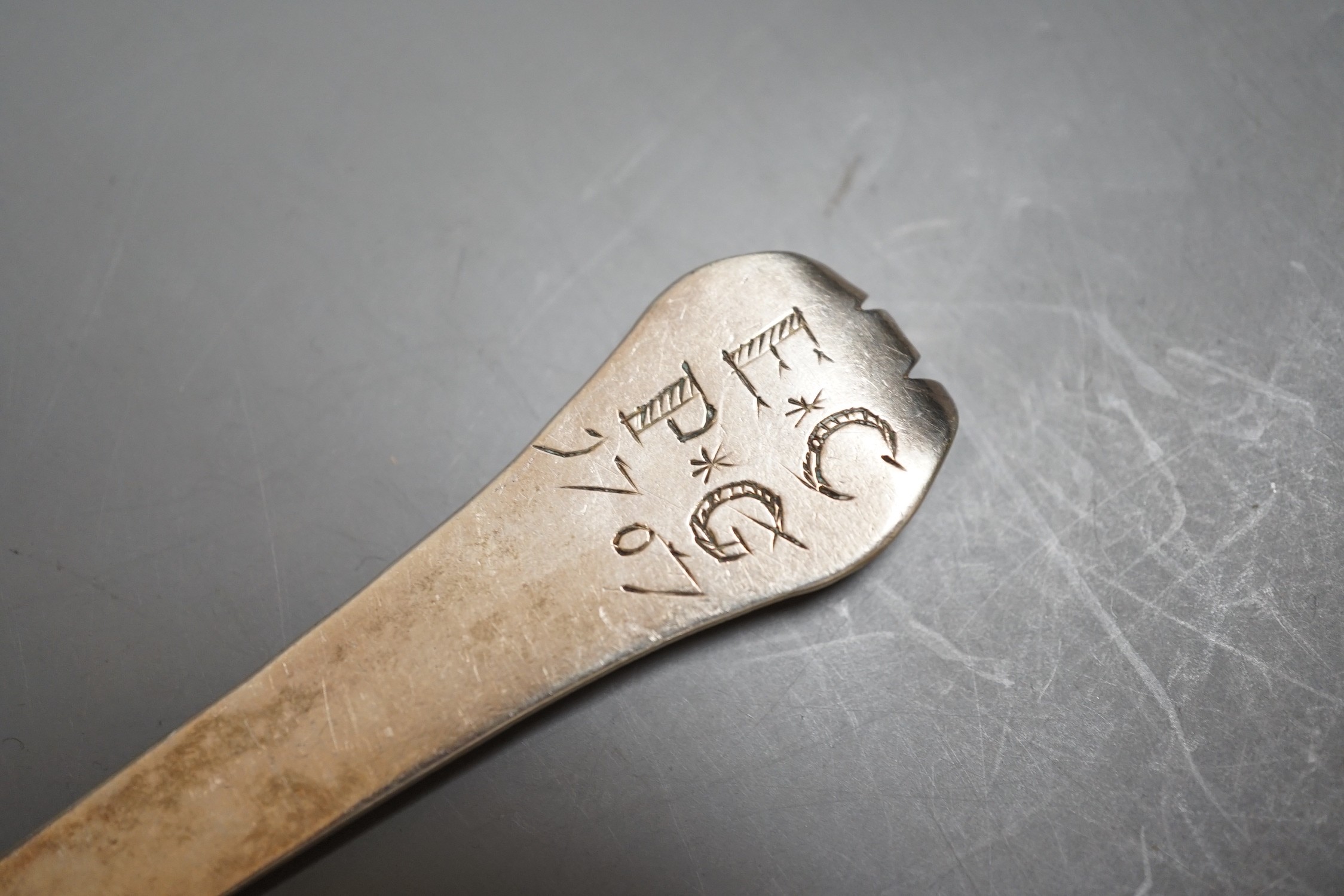 An early 18th century white metal trefid spoon, with engraved initials and date (repair), 19.1cm unmarked, 47 grams.